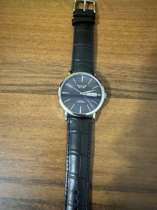 Продам часы Omax