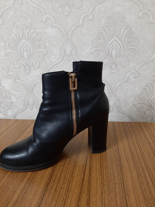 Продам женские  сапоги