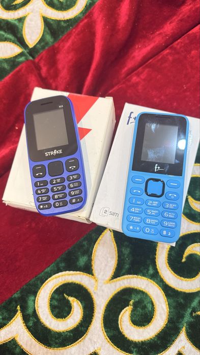 Кнопочные телефоны новые с зарядкой