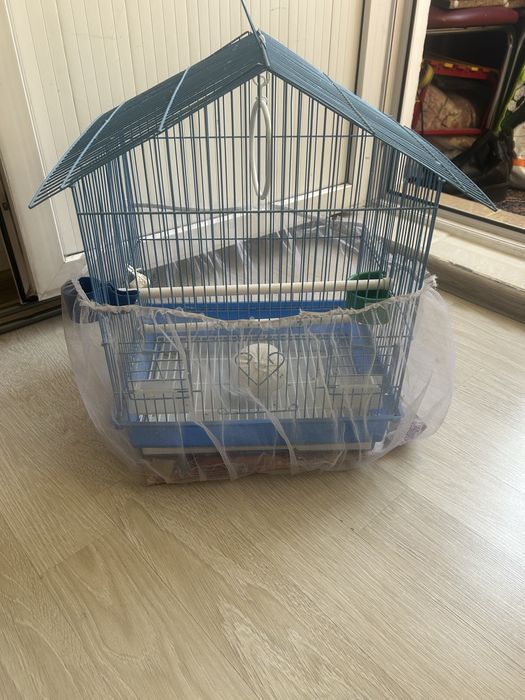 Клетка для папугая животные
