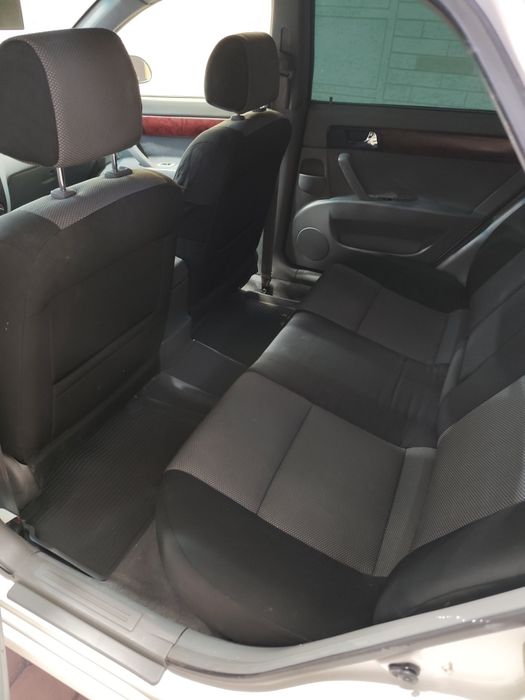 Lacetti 1.8 бир қўл мошина