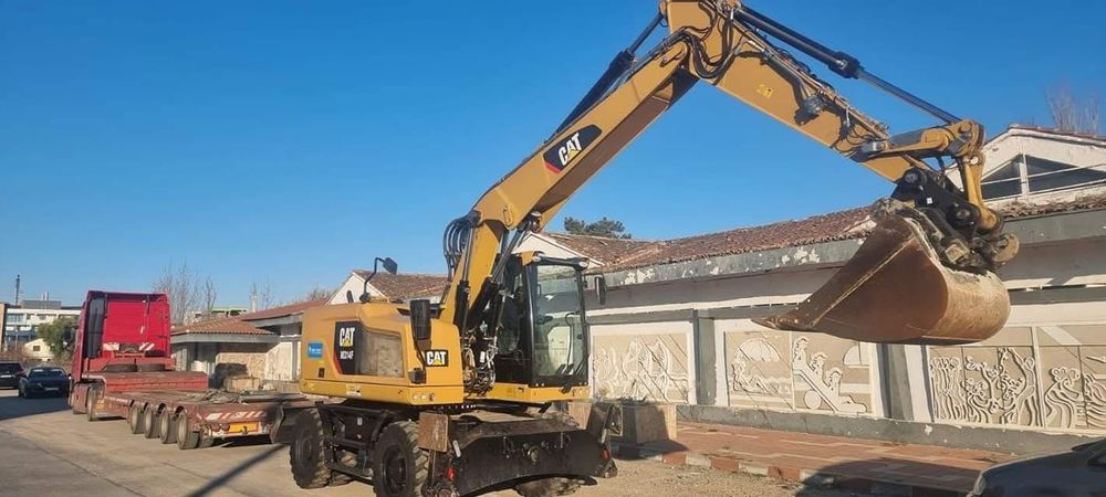 Închirieri Buldoexcavator,Camioane