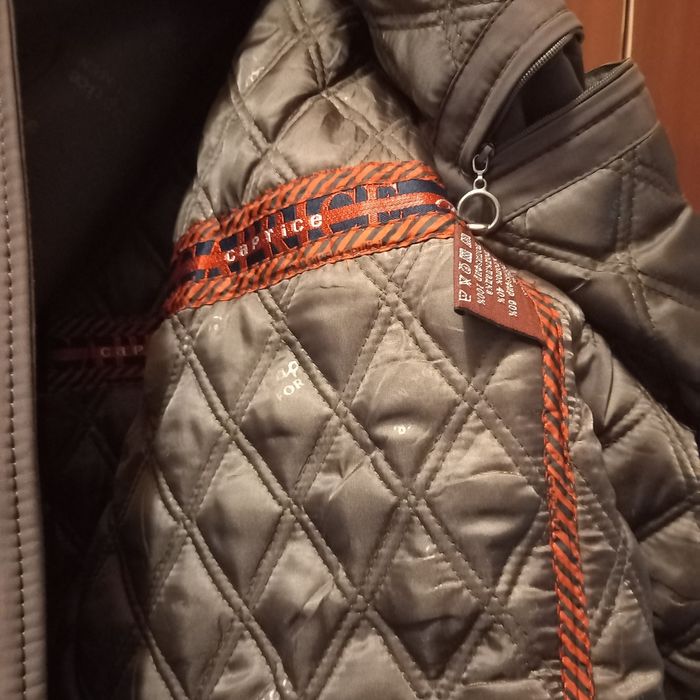 шапки и куртка Caprice.