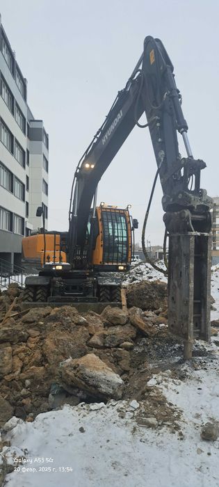 Колёсный экскаватор Хундай 180