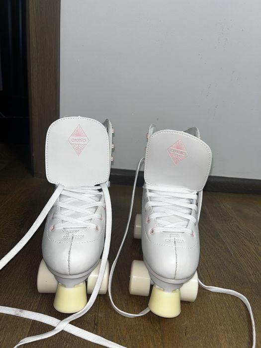 Role cu patru roți Oxelo – Alb-Roz, Ca Noi!