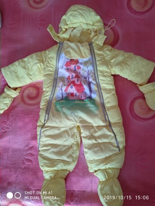 Продам детский зимний комбинезон трансформер.