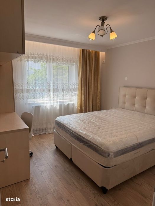 Inchiriere 3 camere, cu loc de parcare, totul nou