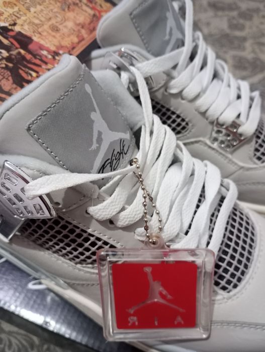 Jordan 4 Frozen Moments