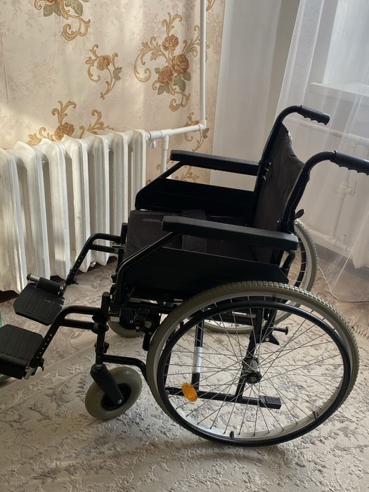 Инвалидное кресло