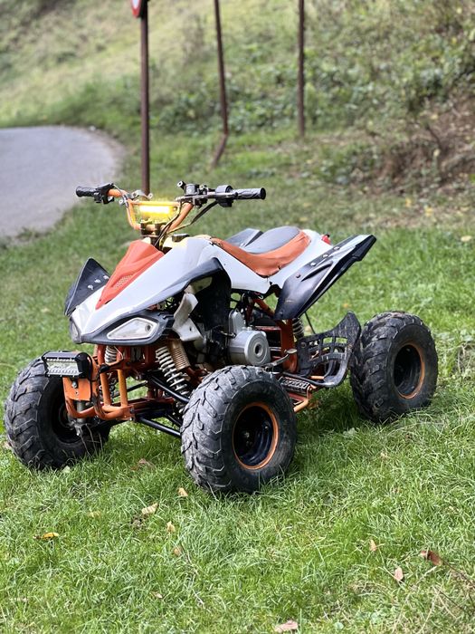 Vând atv de copii de 125 cm automat merge bine trage bine