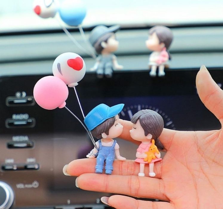 игрушка на панель авто