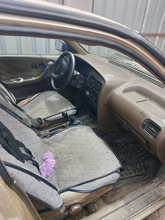 Машина Ниссан примера