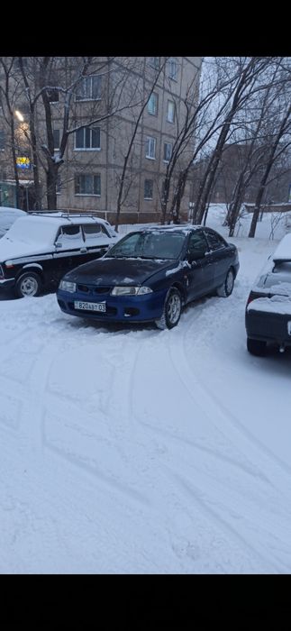 Mitsubishi carisma 1.8 mpi продаю до мая.