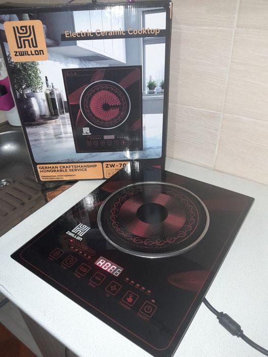 Продам электрическую,сенсорную,настольную плиту