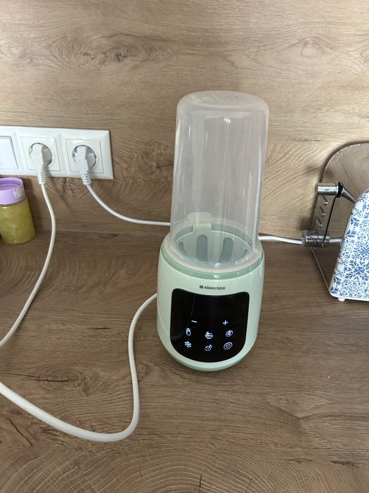 Уред за преваряване или топлене на бебешко мляко/храна