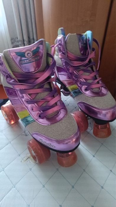 Роликовые коньки