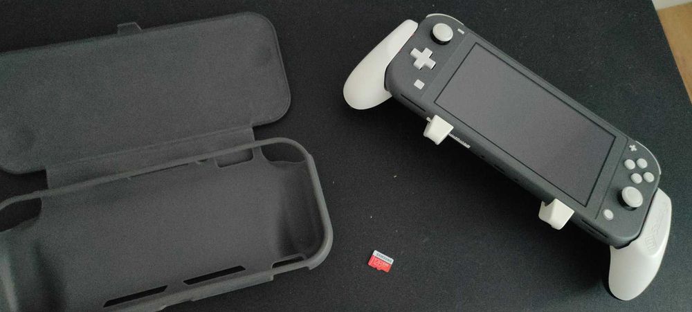 Vand Nintendo Switch Lite + Accesorii