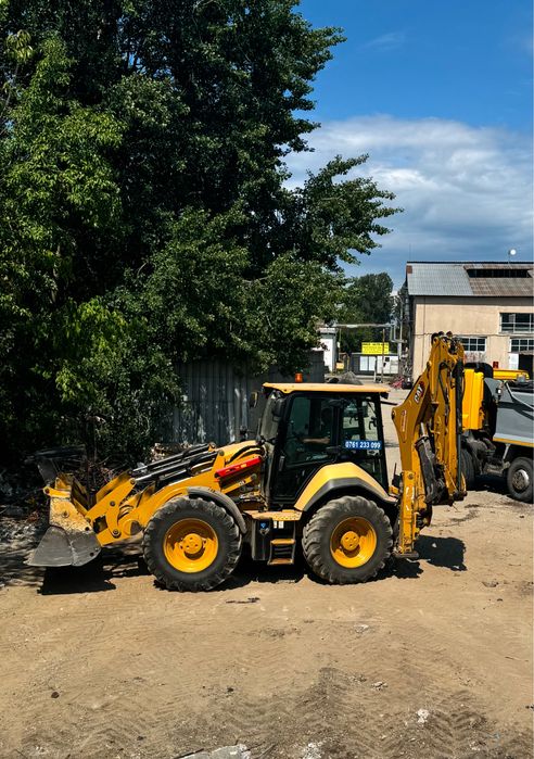 Inchiriere  buldoexcavator Caterpillar 434 roti egale