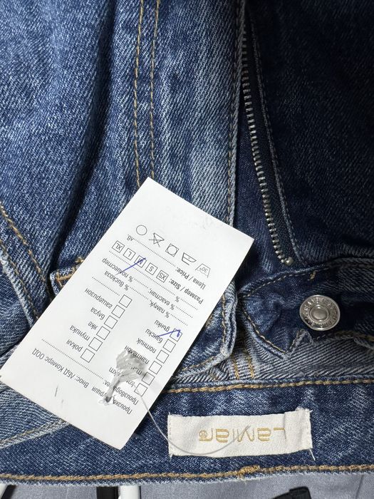 Дънки с накъсани крачоли