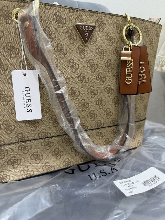 Обмен сумка guess