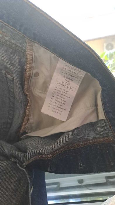 дънки Carhartt модел Klondike №34, цвят тъмносин, в перфектно състояние, подходяща дължина за мъж около 172-175 см.