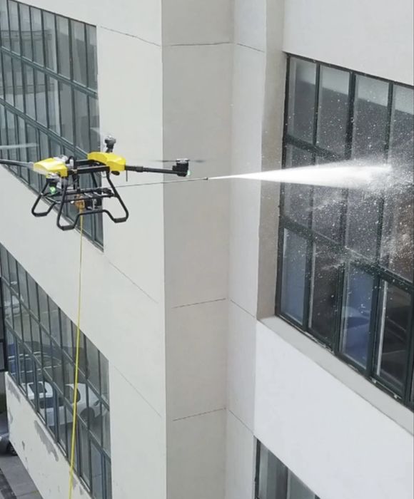 Мойка окон и фасадов дронами  Без альпинистов и лесов