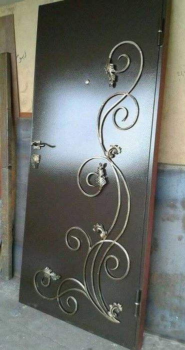 Металлические двери с элементами ковки, изготовление, установка