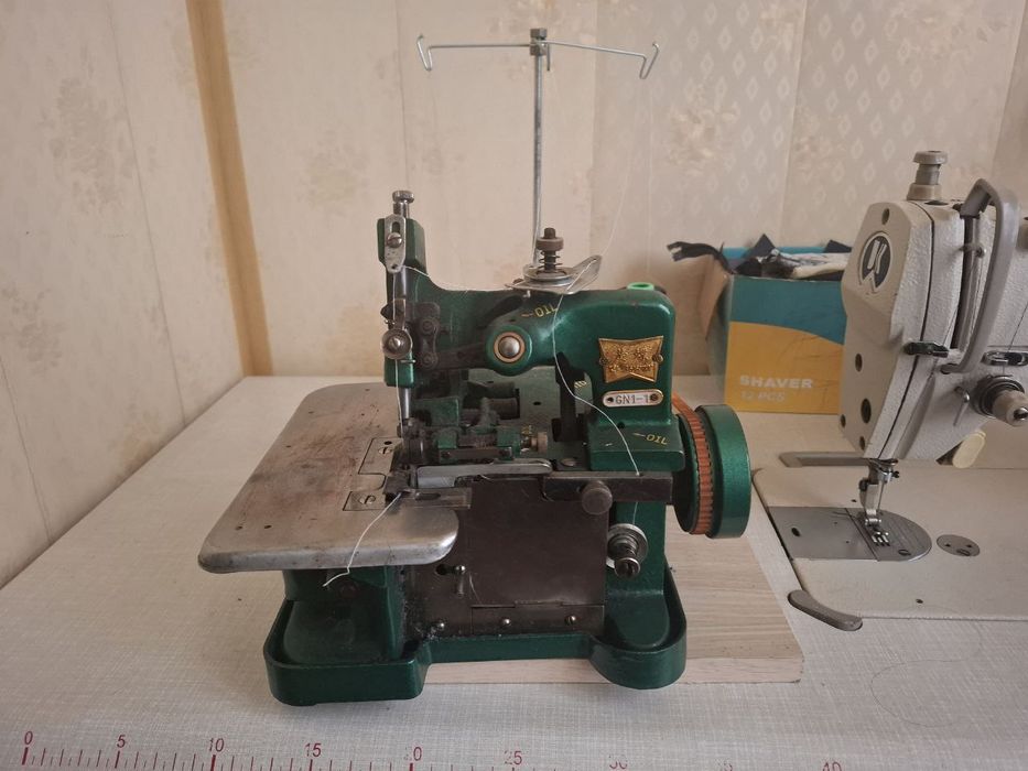 Тикув машинаси аверлоги билан сотилади  300$