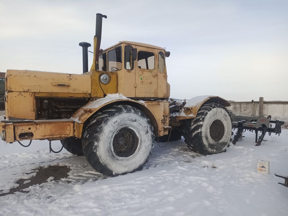 Продам К700 с плугами