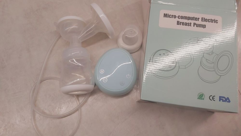 Продам электрический молокоотсос