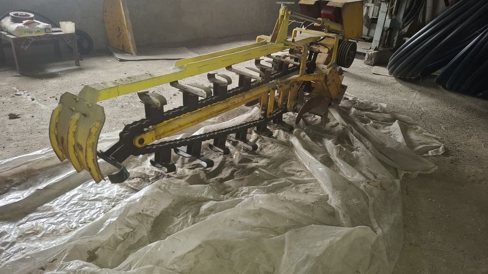 Цепной траншеекопатель