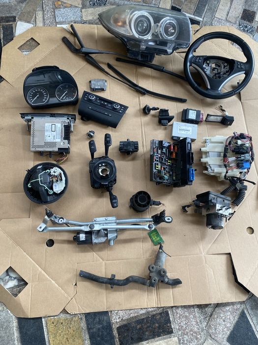 Volan ,far xenon ,aeroterma ,contact ,comanda clima Bmw seria 1 e87