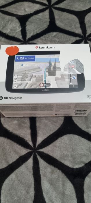 Vând  TomTom  Go Navigator 7"  Wifi,  Bluetooth,  etc.
