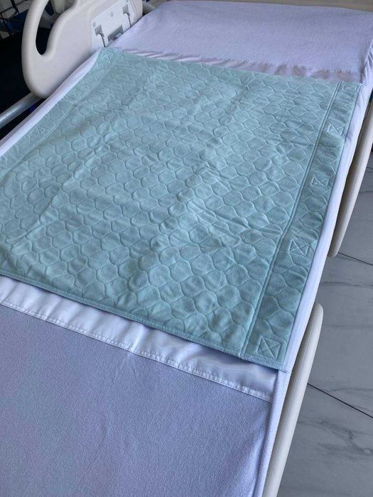 Медицинская простыня с наматрасником прердвижной