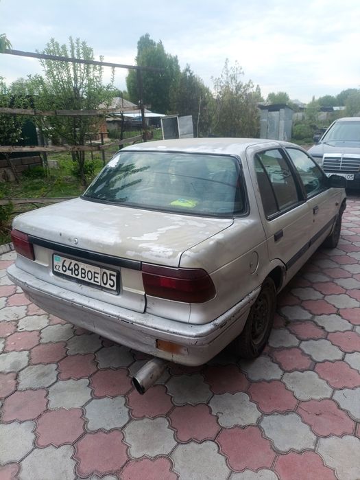 Митсубиси Лансер 6