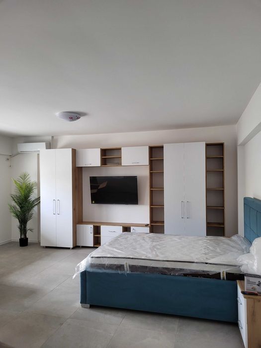 Garsoniera moderna de inchiriat Calea Bucuresti 400 euro 42 mp mobilata si utilata complet AC centrala pe gaz loc de parcare constructie 2024