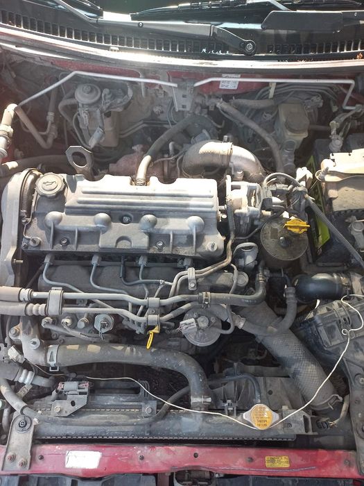 Мазда 323 90 к.с