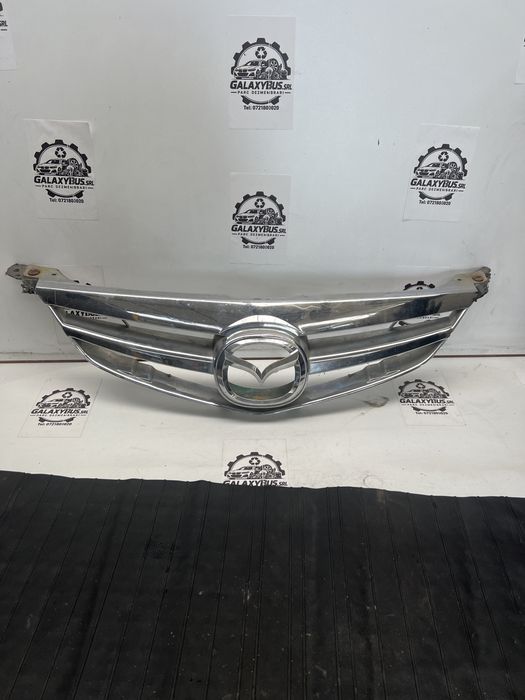 Grila fata stema Mazda 6  gg 2003-2007 Piese dezmembrari Mazda