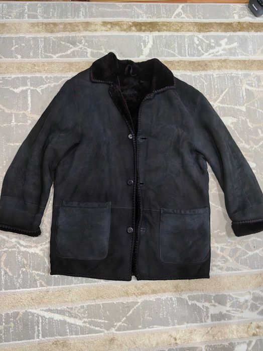 Продам мужскую дубленку 54-56 размера черного цвета