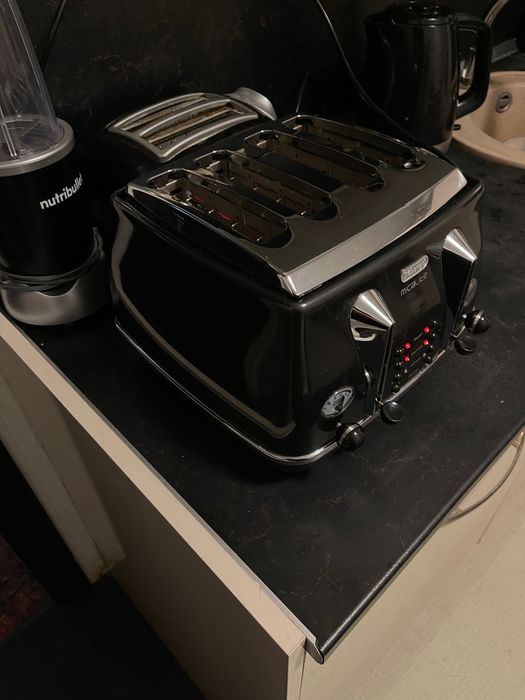 Тостер Delonghi с четири гнезда