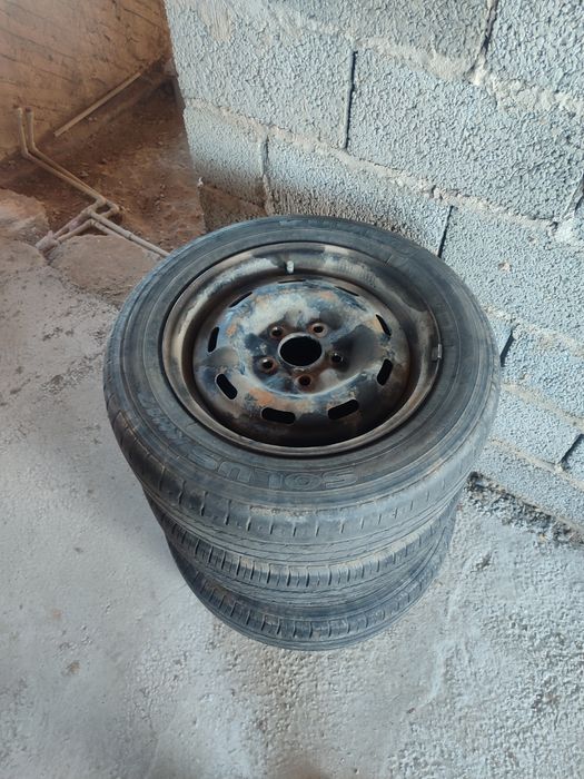 Железный диск покрышкамен бірге