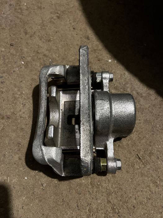 Суппорт задний левый SsangYong Kyron