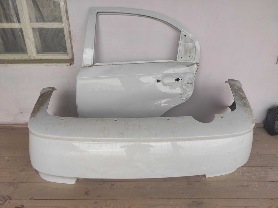 Nexia 3 Orqa orqa eshik sotiladi