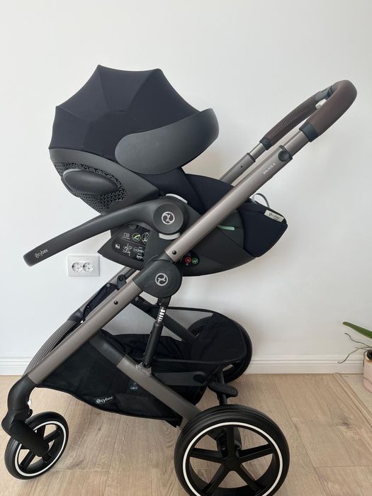 Vand scoica auto Cybex Cloud G i-Size utilizata putin + adaptori carucior