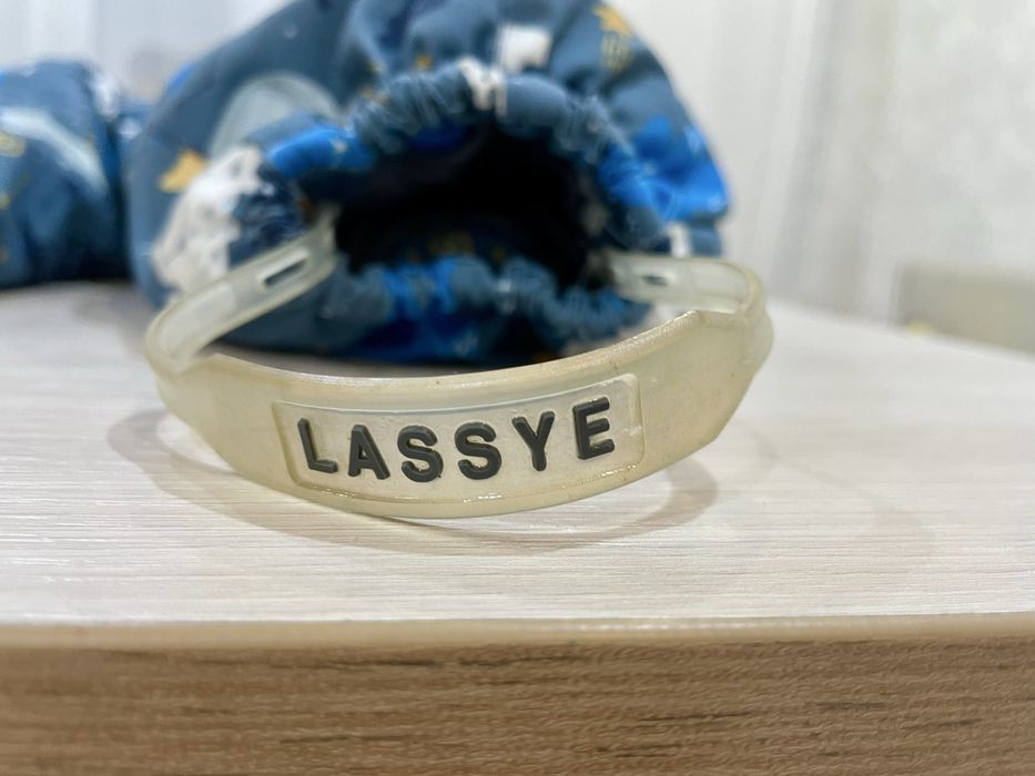 Продам зимний комбинезон Lassye