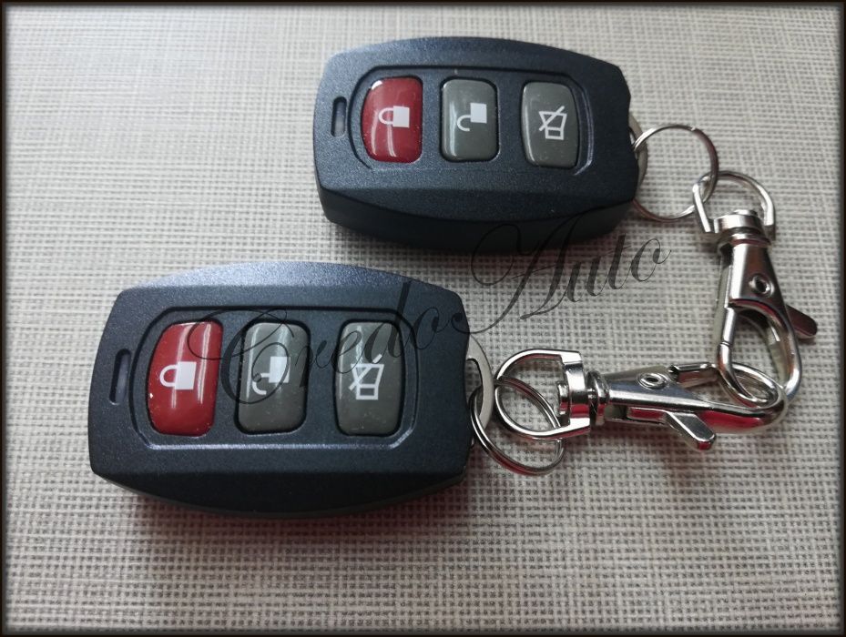 Промо!Автоаларма Octopus YK16. Две дистанонни+вдигане на стъкла+багаж.