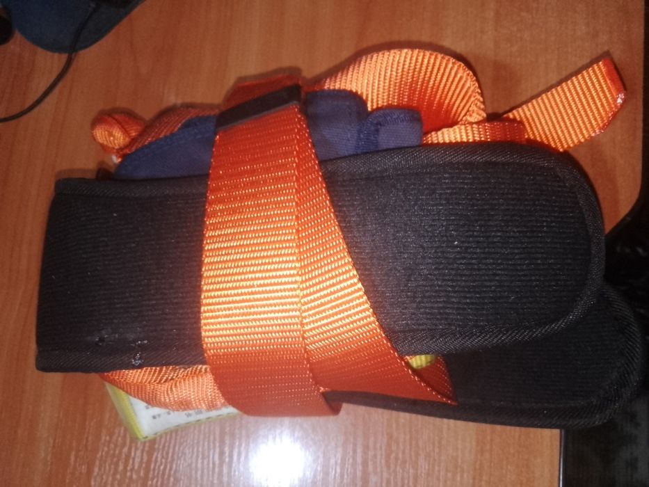 Страховочный пояс для строительства.