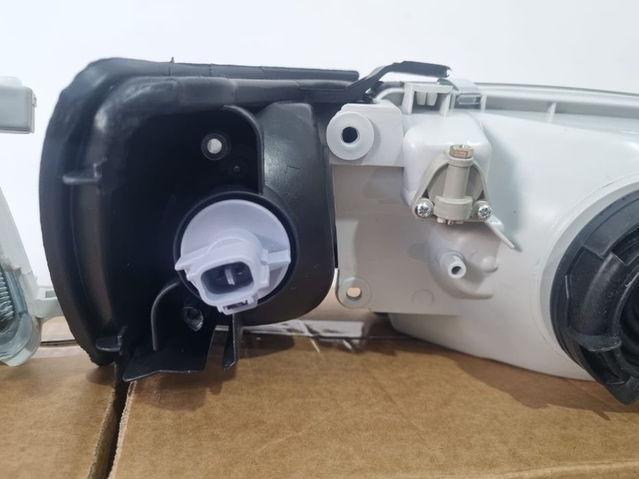 Карина Е бампера, фары, капот, крыло, решетка