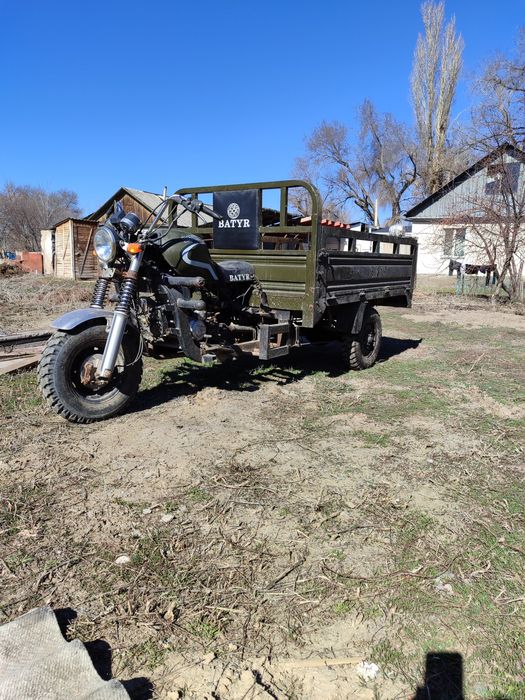 Трехколесный мотоцикл