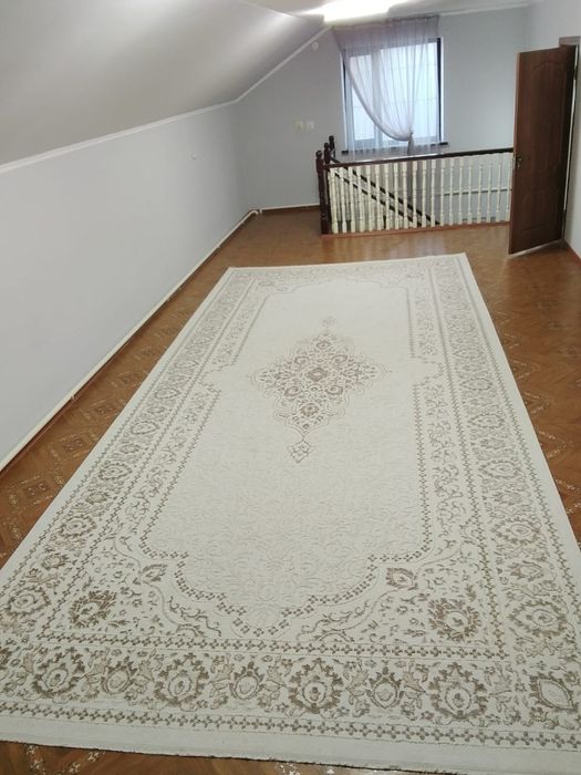 Ковер и велосипед